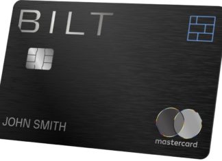 a black credit card with silver and blue text