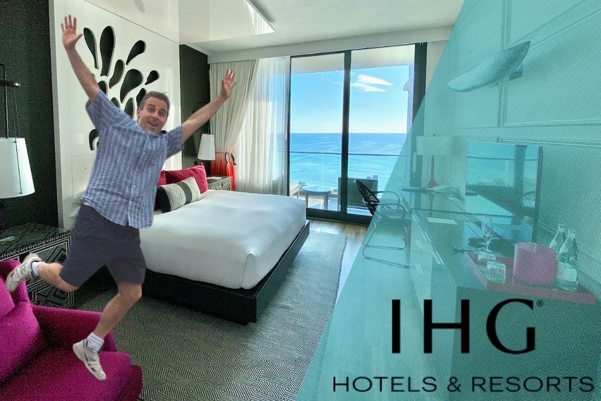 a man jumping in a hotel room