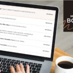 a person typing on a laptop