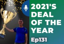 a man holding a trophy