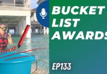 a bucket of water with a red pen