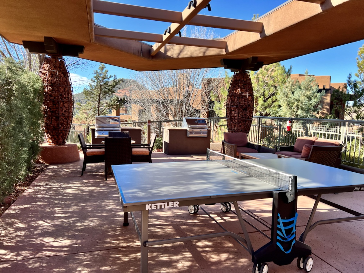 a table tennis on a patio