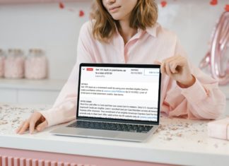 a woman holding a laptop