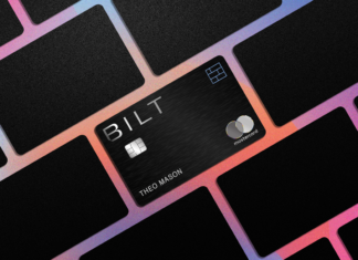 a black credit card with a silver and silver logo