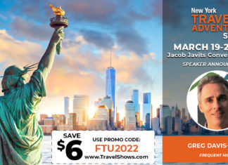 a poster of a statue holding a torch