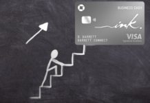 a credit card with a drawing of a man climbing the stairs