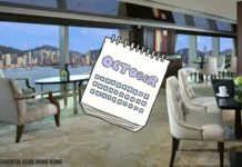 a room with a calendar and chairs