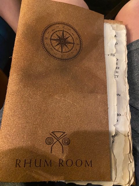 a brown book with a compass on it