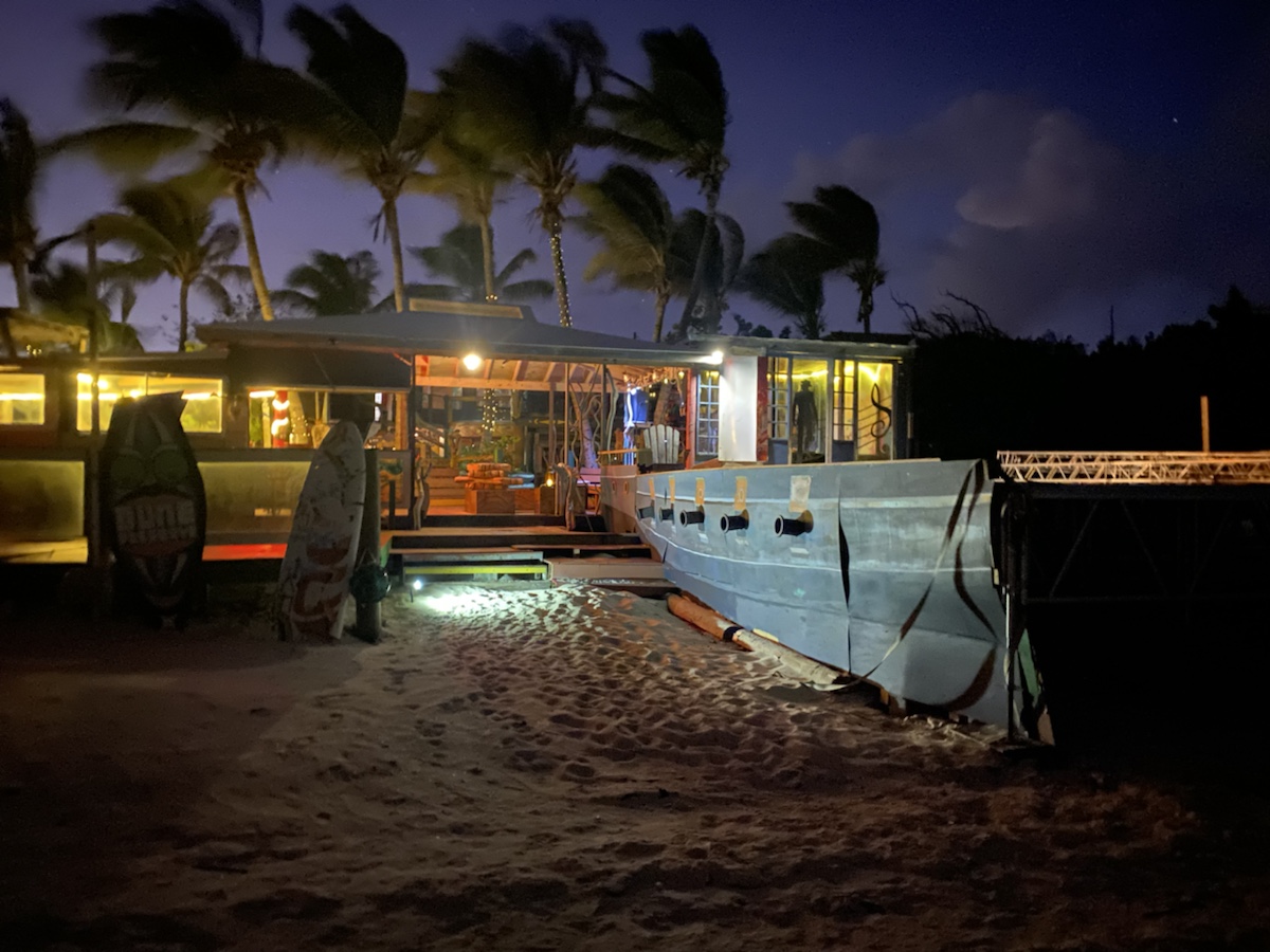 a boat on a beach at night