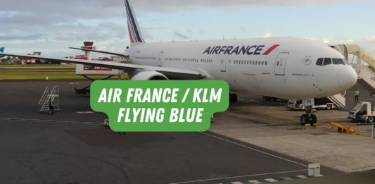 a large white airplane on a tarmac