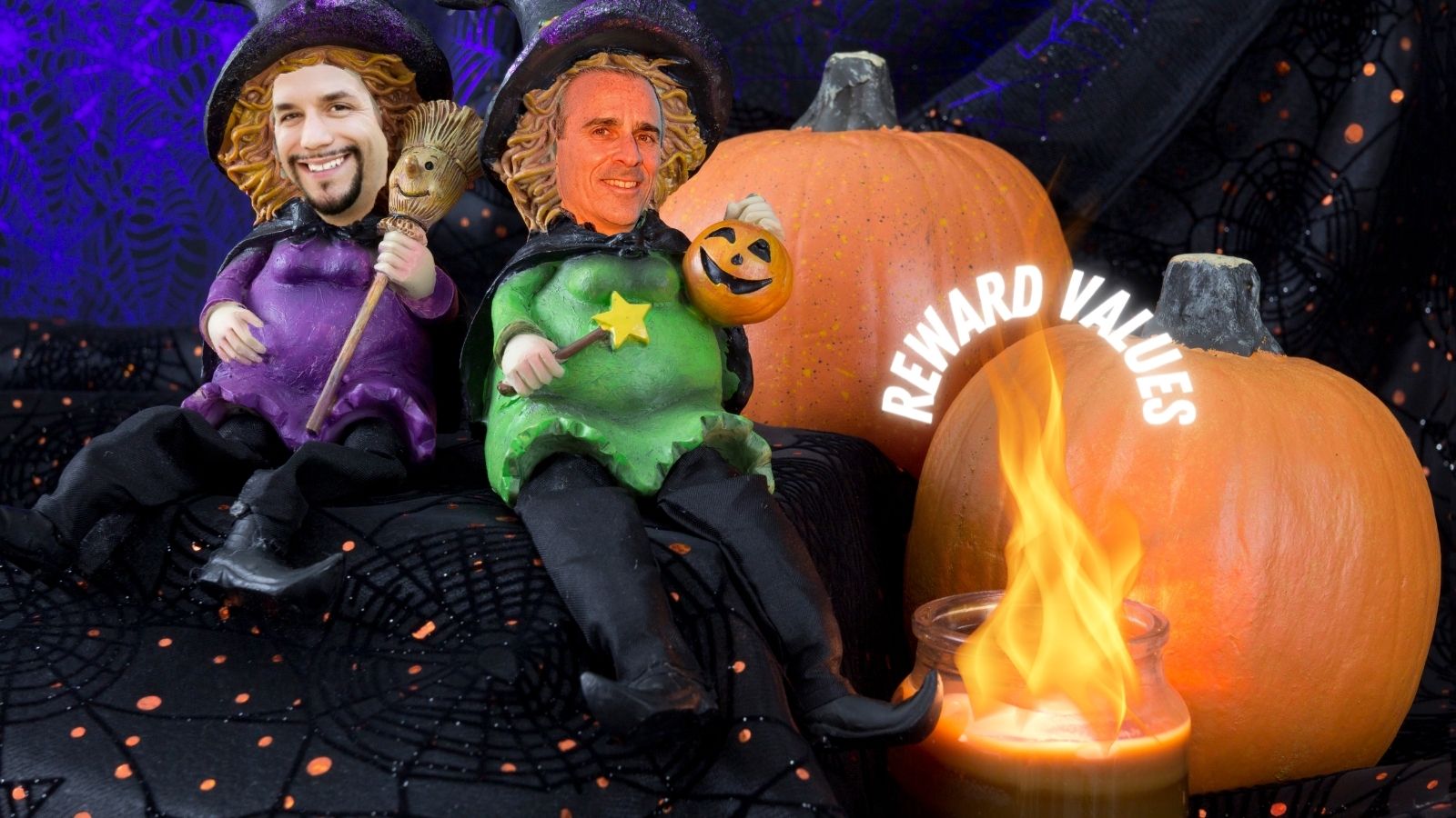 two men in clothing sitting on a couch with pumpkins and a candle