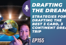 a man pointing at a globe