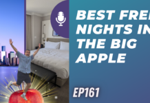 a man jumping on an apple in a hotel room