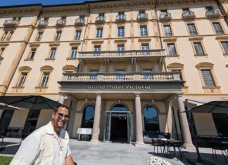 a man standing in front of a hotel