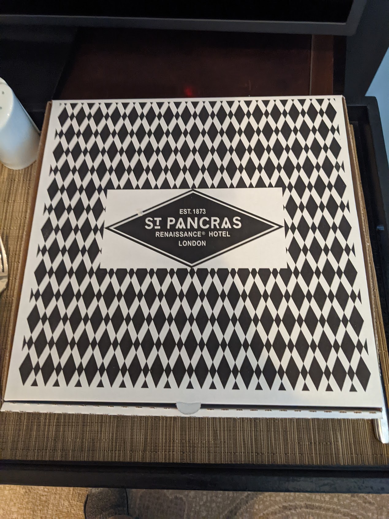 a pizza box with a diamond pattern