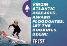 a man surfing on a plane