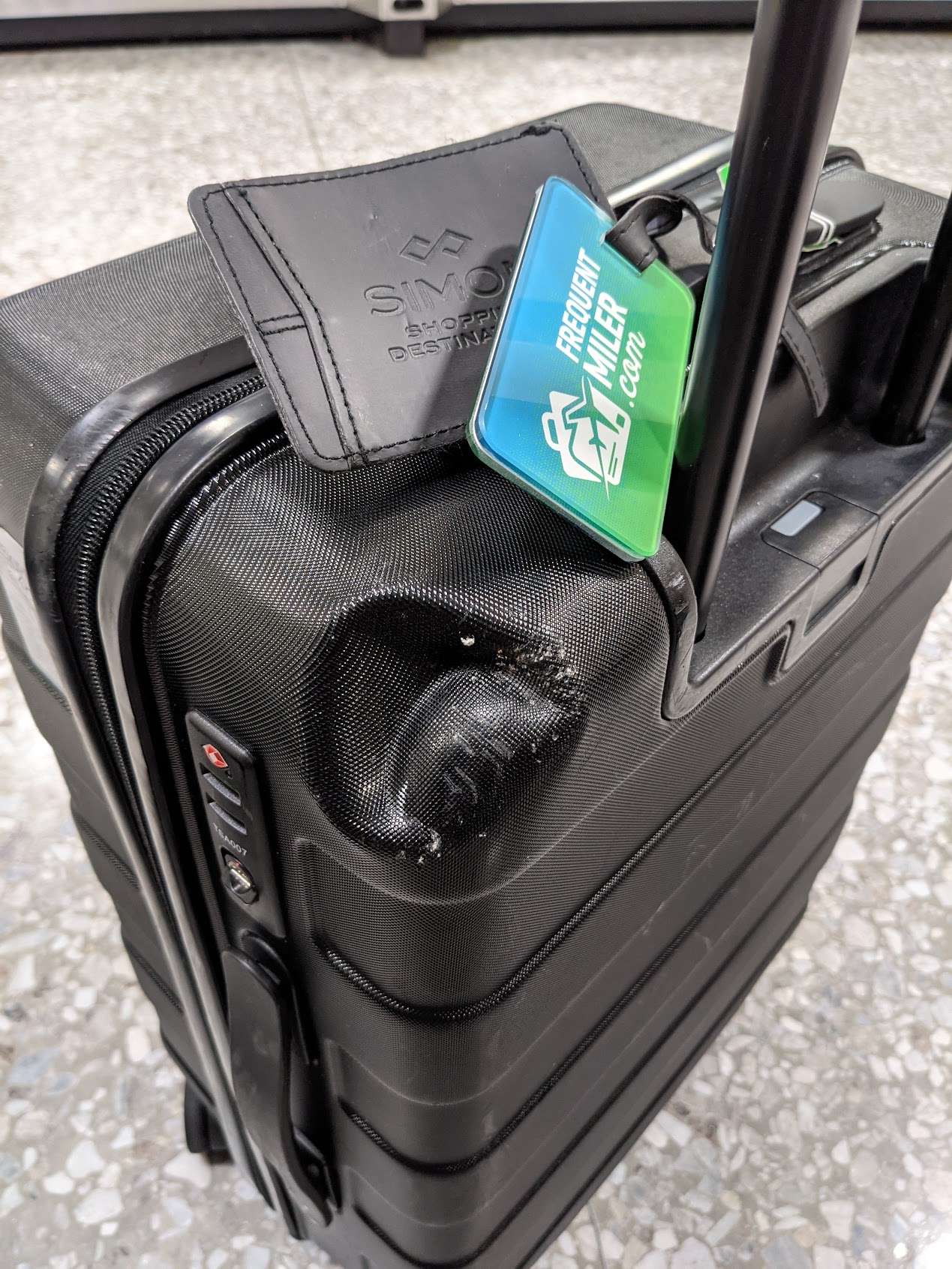 a luggage with a tag on it
