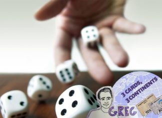 a hand throwing dice