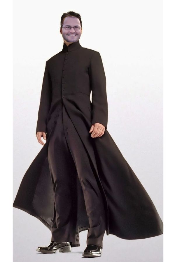 a man in a long black coat