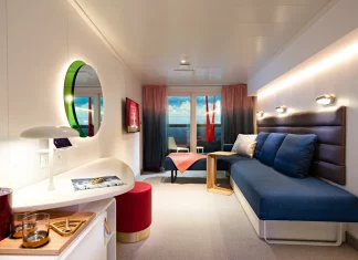 a room with a couch and a desk