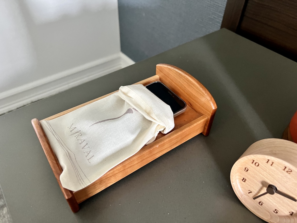 a phone in a wooden box