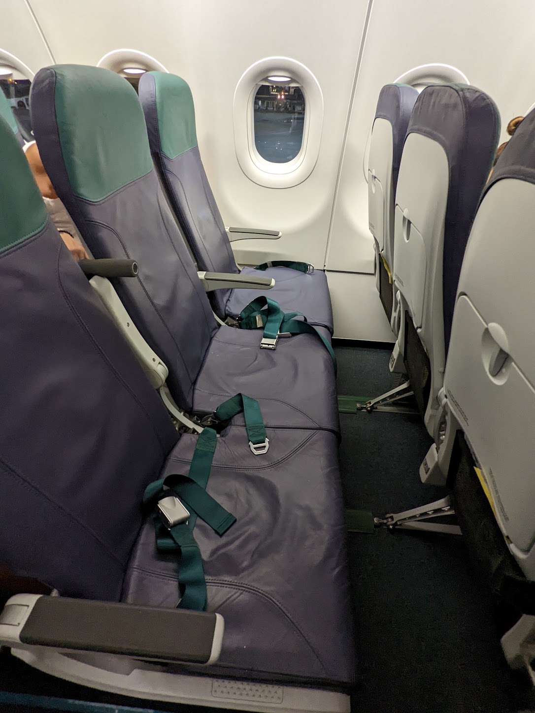 seats in an airplane with seats and windows