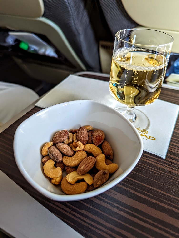 Champagne & warm nuts on Etihad business class flight