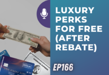 a hand holding a dollar bill