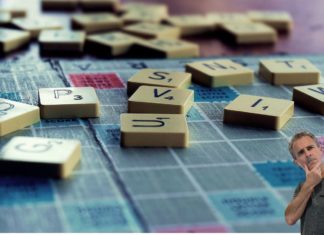 a group of scrabble tiles on a table