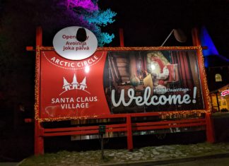 a sign with a picture of santa claus