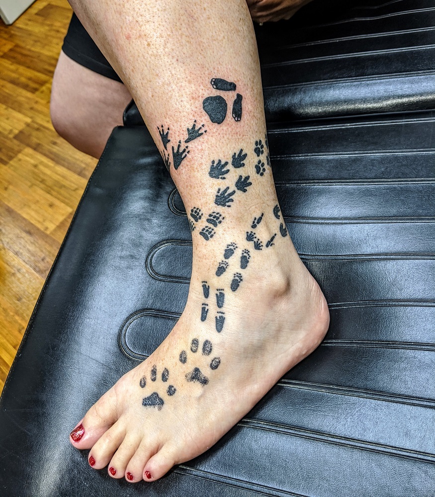 Shae's pawprint tattoos