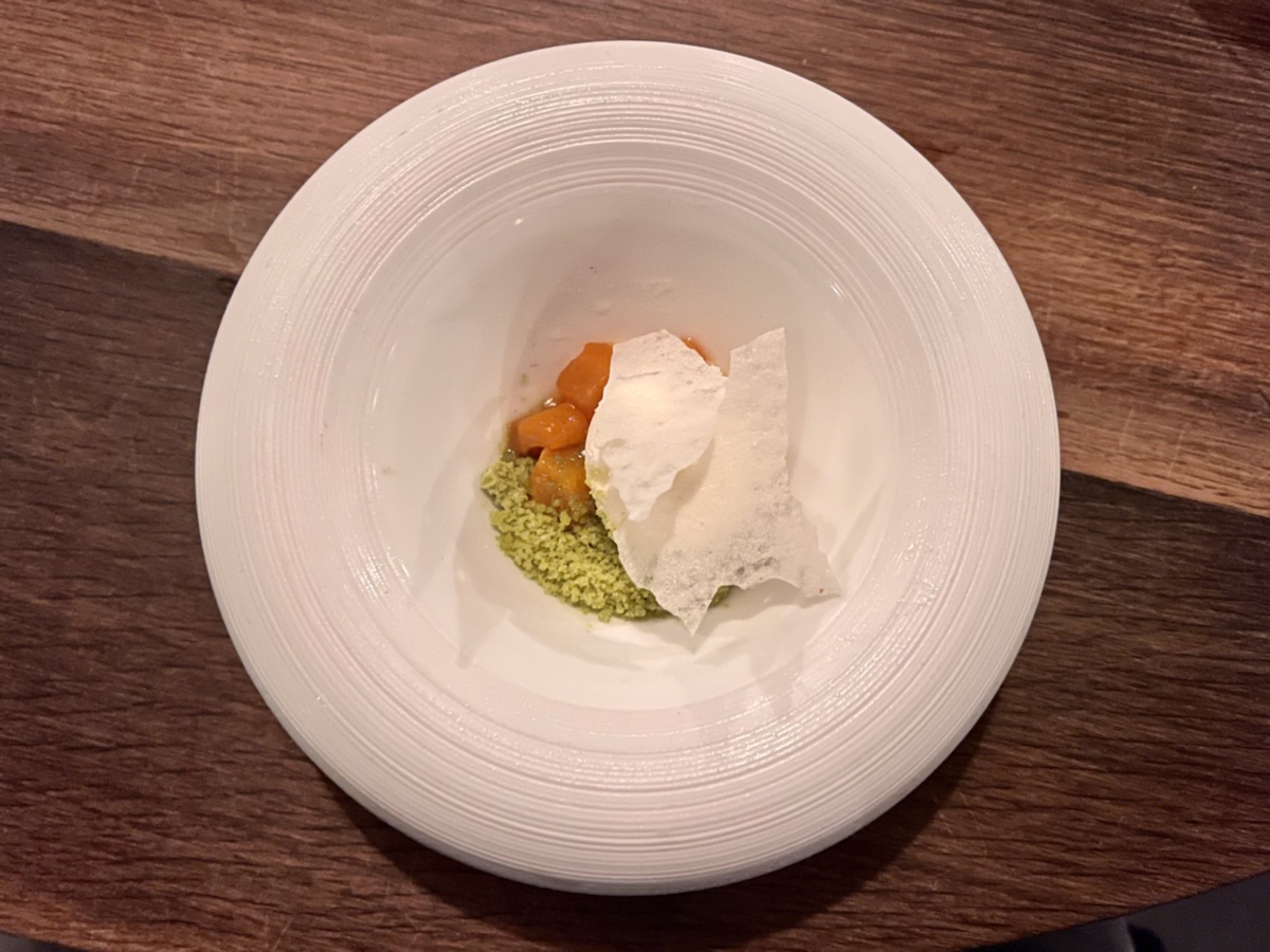 a white plate with food in it