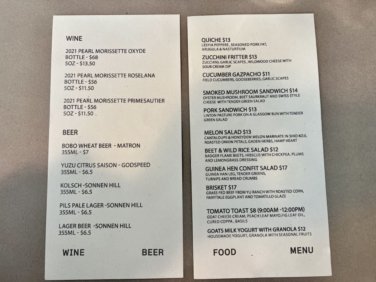 a paper menu with black text