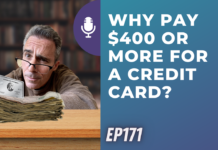 a man holding a stack of money