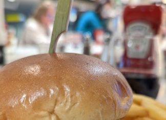 a burger with fries on a plate