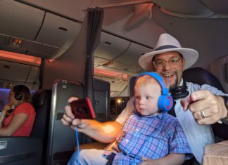 a man and a baby on an airplane