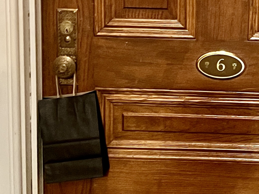 a bag on a door handle