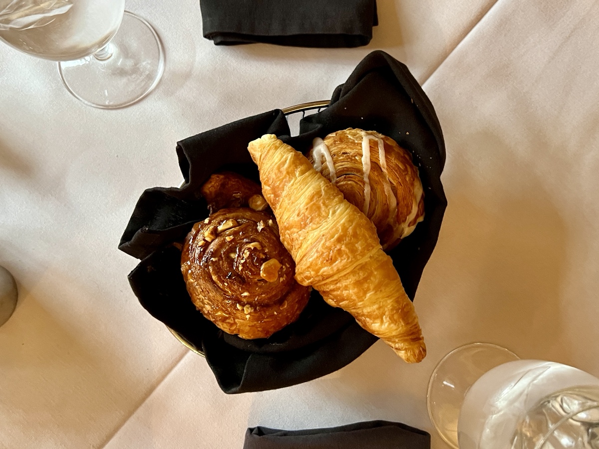 a basket of pastries on a table