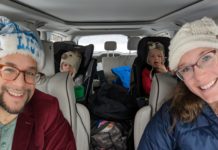 a group of people in a car