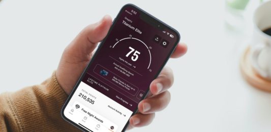 a hand holding a phone