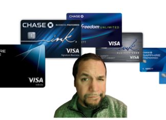 a man with a beard and a few credit cards