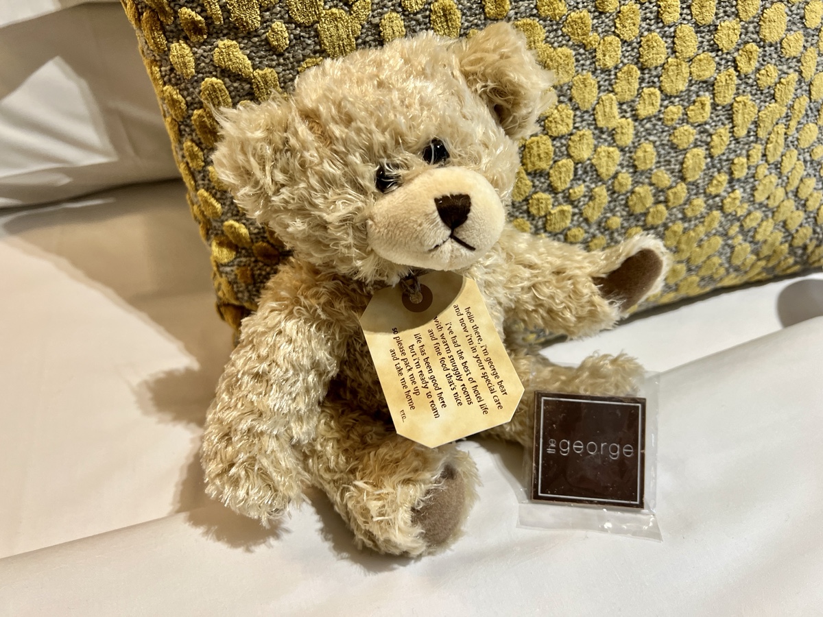 a stuffed bear with a tag