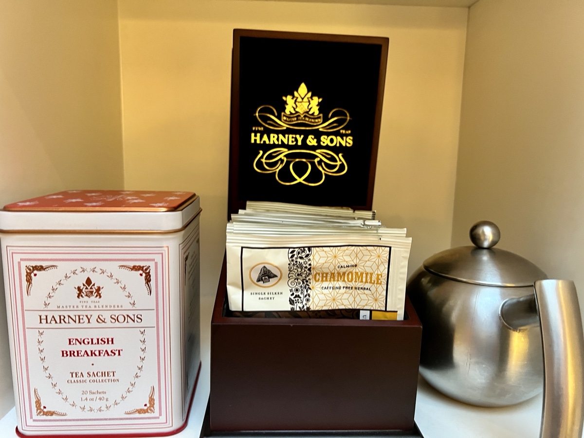 a tea box and tea pot on a shelf