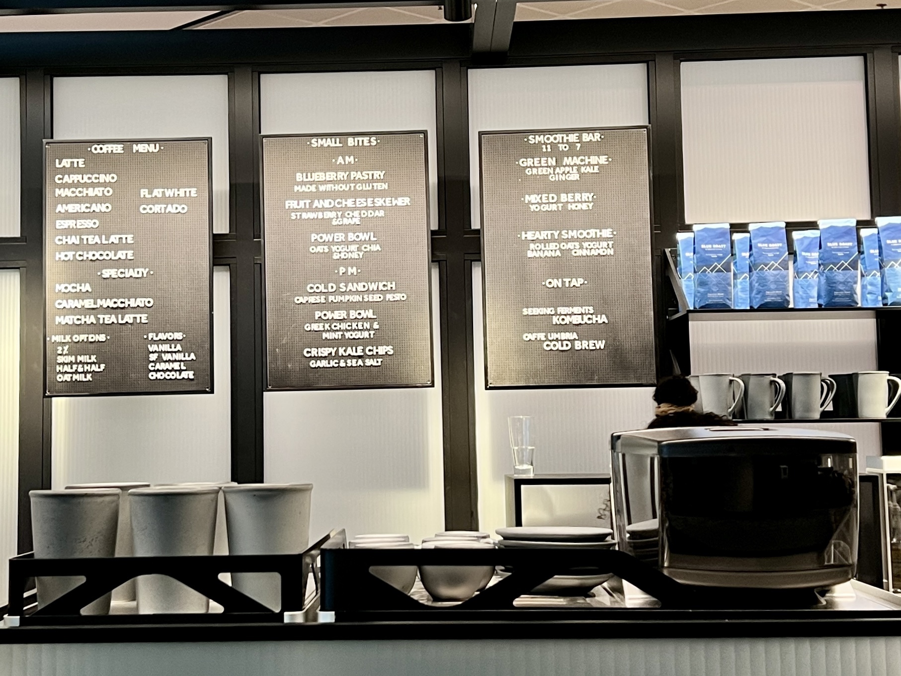 a menu board with white text on it