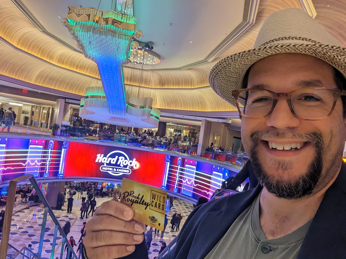 a man taking a selfie in a casino