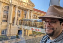 a man wearing a hat and glasses