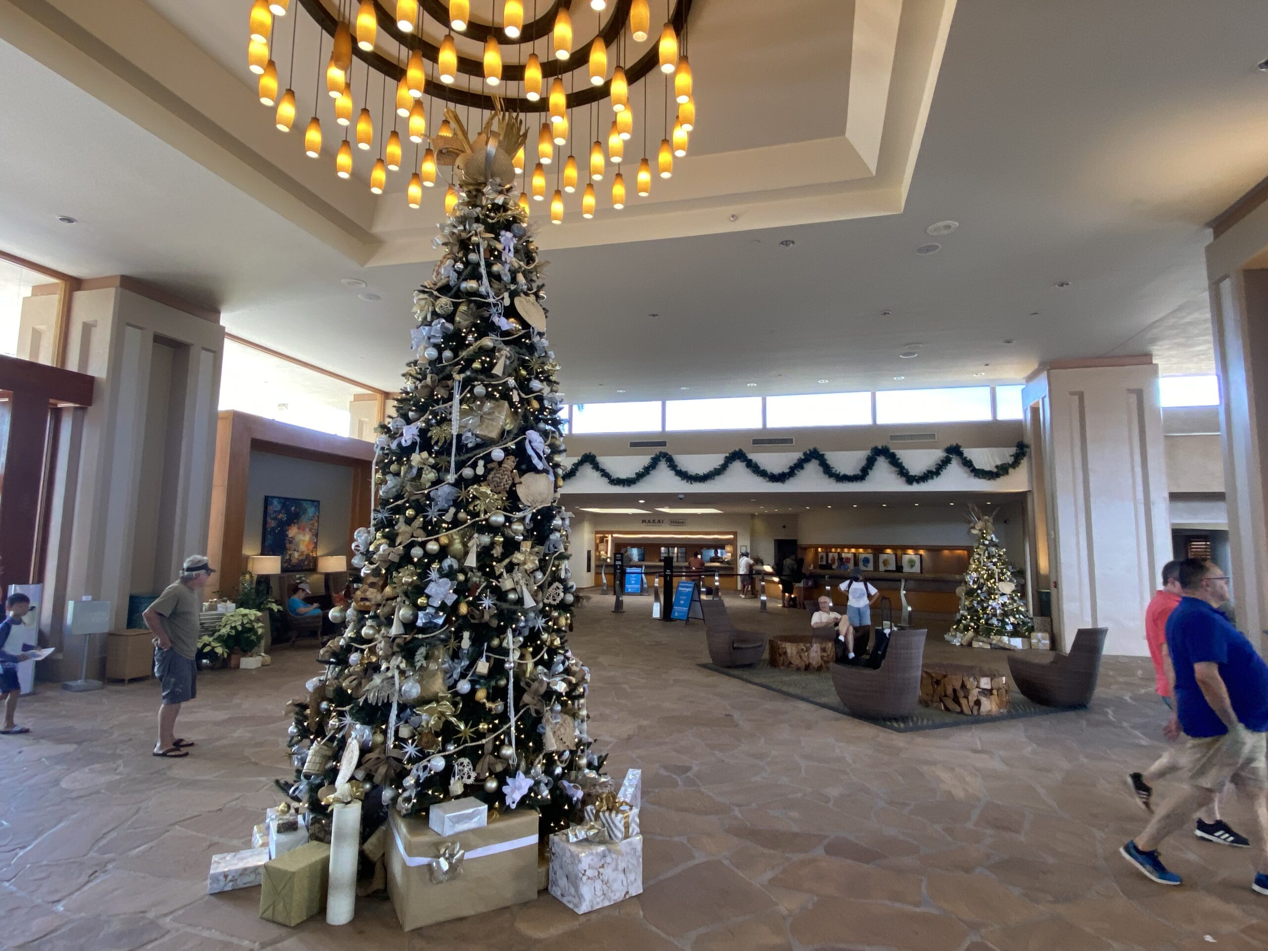 a large decorated tree in a lobby
