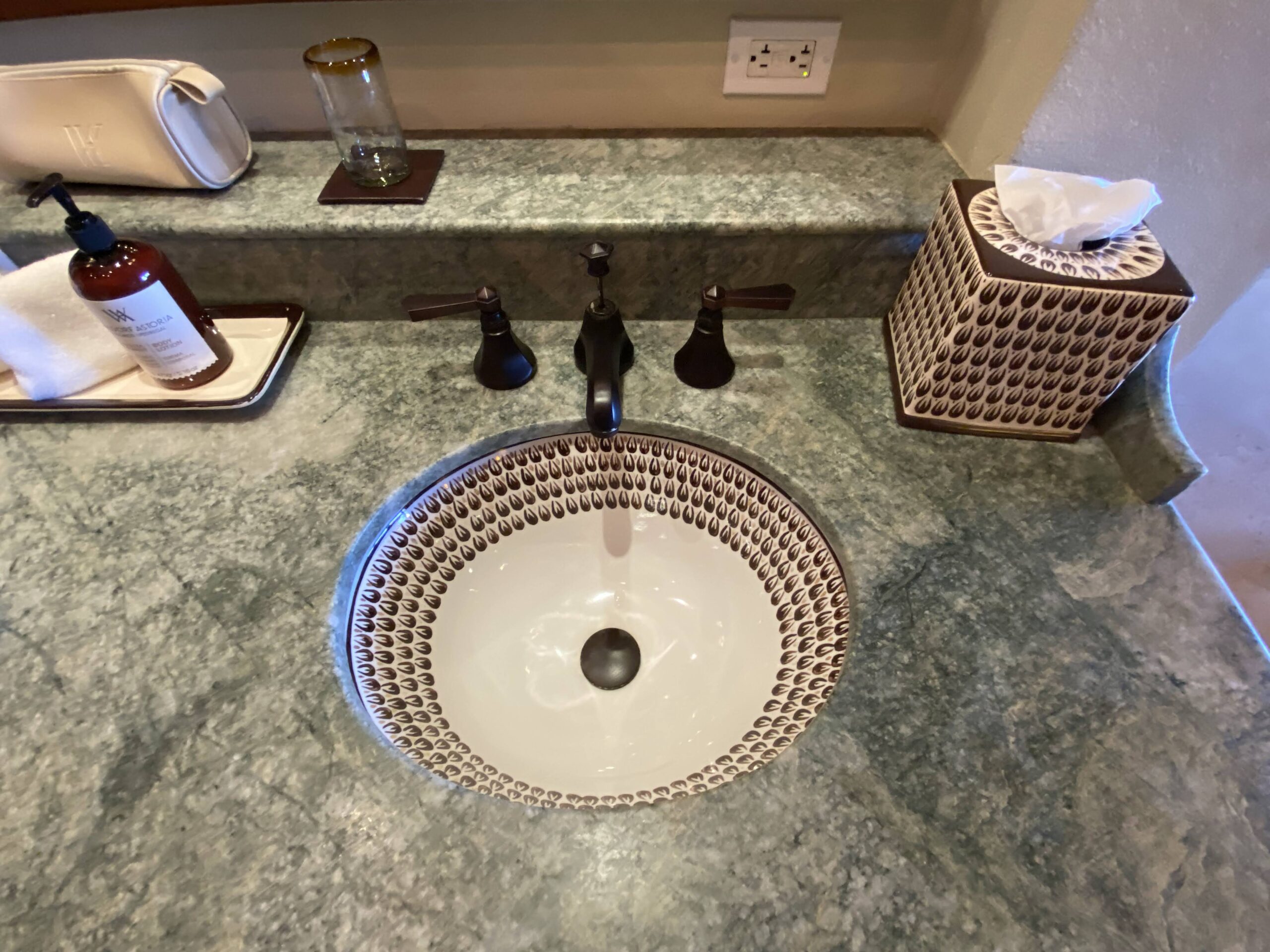 a sink with a white sink and a black and white sink