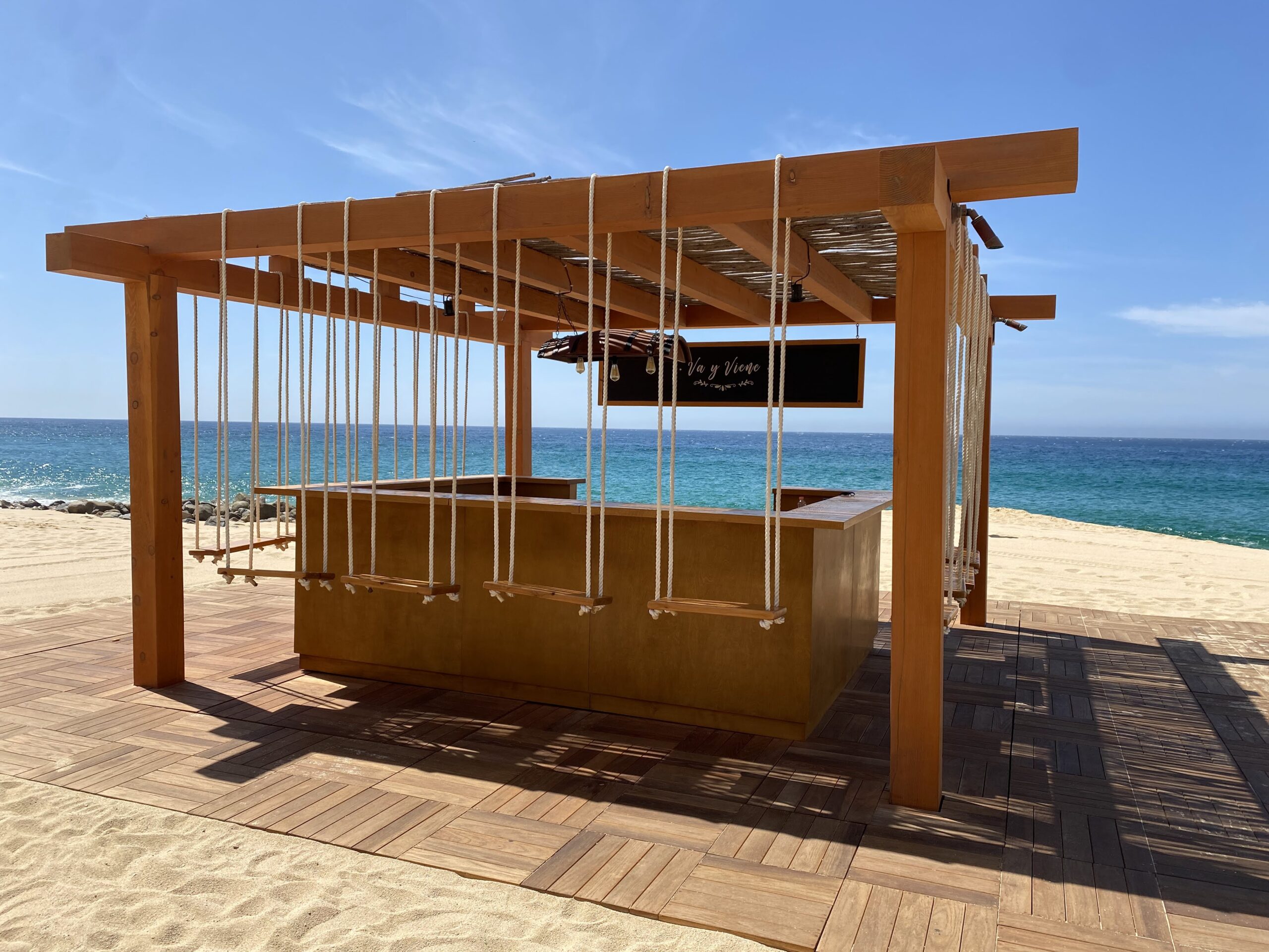 a wooden structure on a beach