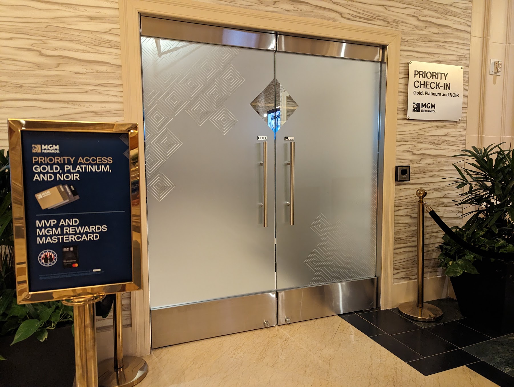a glass doors with a sign